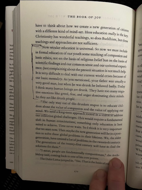 Picture of page 272 in The Book of Joy, which talks about how education should be updated to include teachings on compassion and ethics based on common sense, scientific findings, and universal experience.
