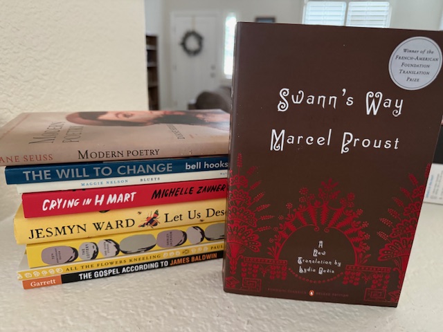 Copy of Swann's Way standing next to other 2025 CRP titles, stacked. 